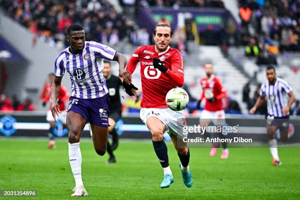 Kevin KEBEN BIAKOLO of Toulouse and Yusuf YAZICI of Lille during the Ligue 1 Uber Eats match between Toulouse Football Club and LOSC Lille at Stadium...