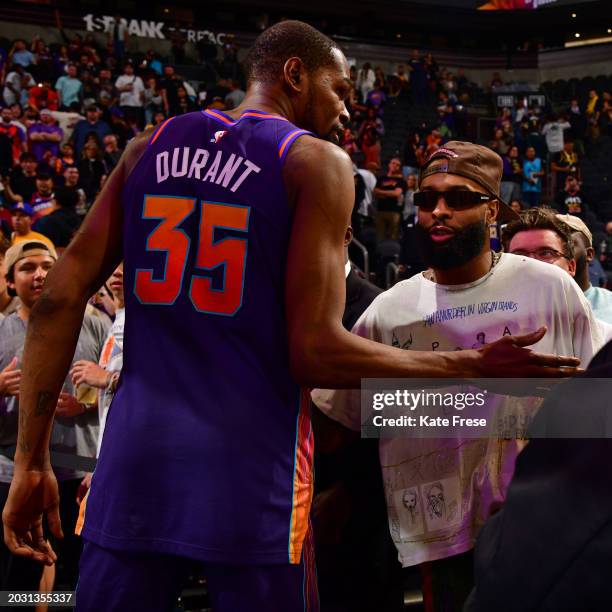 Odell Beckham Jr. Talks to Kevin Durant of the Phoenix Suns after the game against the Los Angeles Lakers on February 25, 2024 at Footprint Center in...