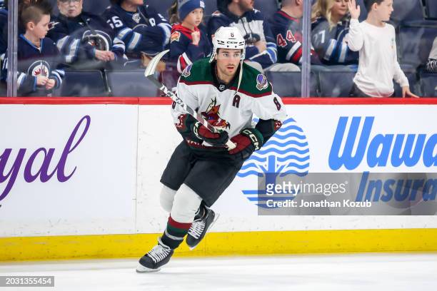 Nick Schmaltz of the Arizona Coyotes takes part in the pre-game warm up prior to NHL action against the Winnipeg Jets at the Canada Life Centre on...