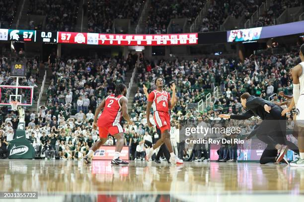 Dale Bonner of the Ohio State Buckeyes celebrates his game winning basket against the Michigan State Spartans at Breslin Center on February 25, 2024...