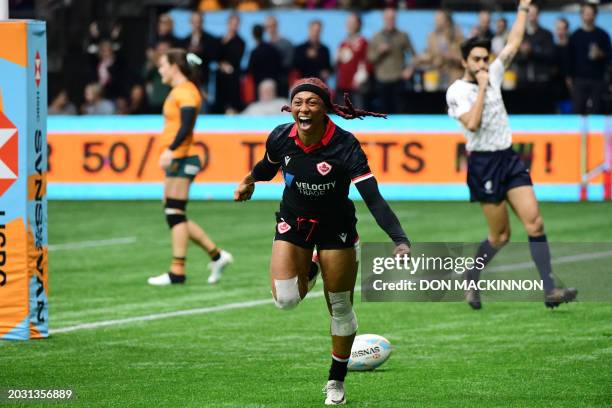 Canada's Charity Williams celebrates scoring a try against Australia during the HSBC SVNS Vancouver tournament in Vancouver on February 25, 2024.