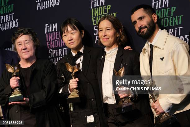 Producers David Hinojosa , Pamela Koffler , Christine Vachon with Best Director director Celine Song hold the award for Best Feature "Past Lives"...