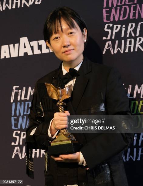 South Korean-Canadian director Celine Song holds the award for Best Director for "Past Lives" during the Film Independent Spirit Awards 39th annual...