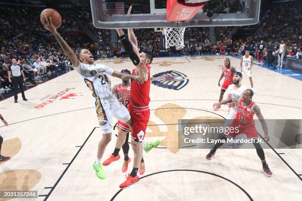 Jordan Hawkins of the New Orleans Pelicans drives to the basket during the game against the Chicago Bulls on February 25, 2024 at the Smoothie King...