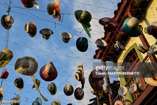Street is decorated with hats in Casco Antiguo in Panama City on February 25, 2024.
