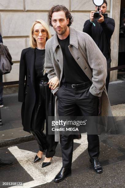 Sam Taylor-Johnson and Aaron Taylor-Johnson are seen arriving at the Giorgio Armani show during Milan Fashion Week on February 25, 2024 in Milan,...
