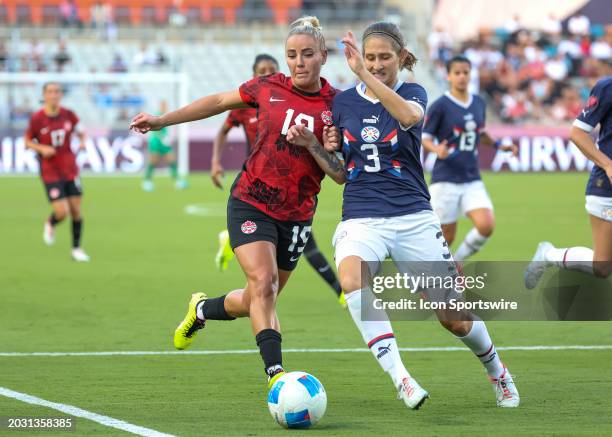 Canada forward Adriana Leon and Paraguay defender Camila Barbosa fight for ball in the second period during the CONCACAF Womens Gold Cup Group C...