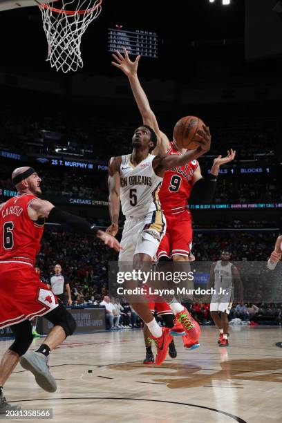 Herb Jones of the New Orleans Pelicans drives to the basket during the game against the Chicago Bulls on February 25, 2024 at the Smoothie King...