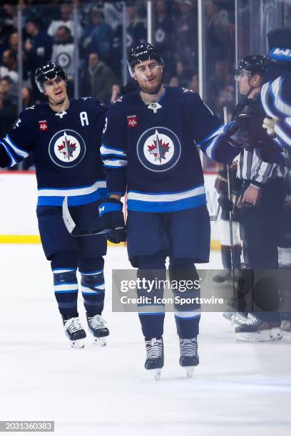 February 25: Winnipeg Jets forward Gabriel Vilardi is congratulated by his team mates on his goal during the regular season game between the Winnipeg...