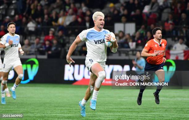 Argentina's Matias Osadczuk scores a try during the 2024 HSBC Canada Sevens rugby tournament match between Argentina and New Zealand at BC Place...