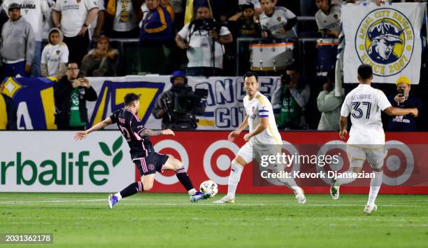 Lionel Messi of Inter Miami scores the equalizer in injury time during the second half against Maya Yoshida of the Los Angeles Galaxy at Dignity...