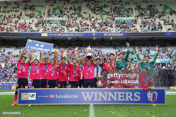 Captain Yoichiro Kakitani of Cerezo Osaka lifts the trophy following the J.League YBC Levain Cup final between Cerezo Osaka and Kawasaki Frontale at...