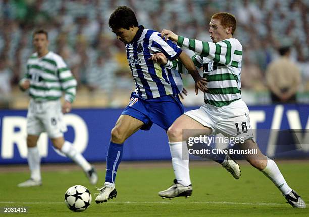 Deco of FC Porto takes the ball past Neil Lennon of Celtic during the UEFA Cup Final match held on May 21, 2003 at the Estadio Olimpico in Seville,...