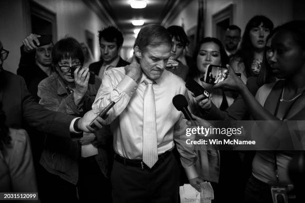 Rep. Jim Jordan speaks to reporters before withdrawing his name as a candidate for Speaker of the House as House Republicans hold a caucus meeting at...