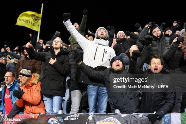 Fans of AFC Ajax celebrate victory after the UEFA Europa Conference League 2023/24 knockout round play-offs second leg match between FK Bodo/Glimt...