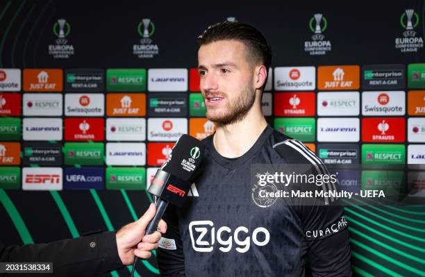 Diant Ramaj of AFC Ajax is interviewed by ESPN after the UEFA Europa Conference League 2023/24 knockout round play-offs second leg match between FK...