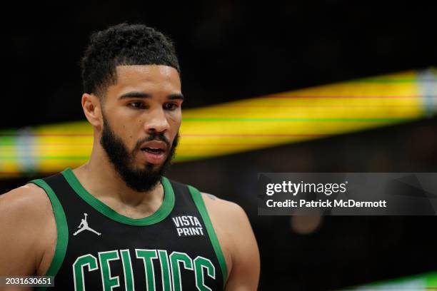 Jayson Tatum of the Boston Celtics looks on during the first half against the Chicago Bulls at the United Center on February 22, 2024 in Chicago,...