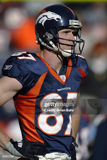 Wide receiver Ed McCaffrey of the Denver Broncos stands on the field during the game against the Arizona Cardinals at Invesco Field at Mile High on...