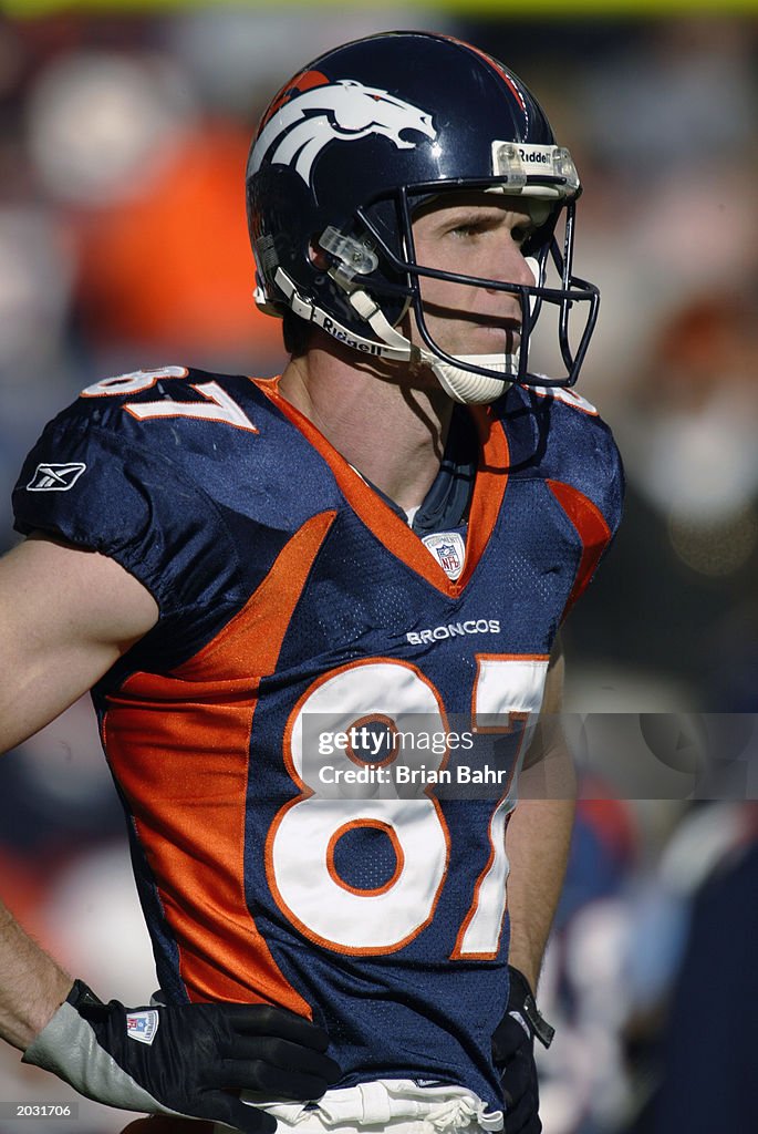 Wide receiver Ed McCaffrey of the Denver Broncos stands on the field