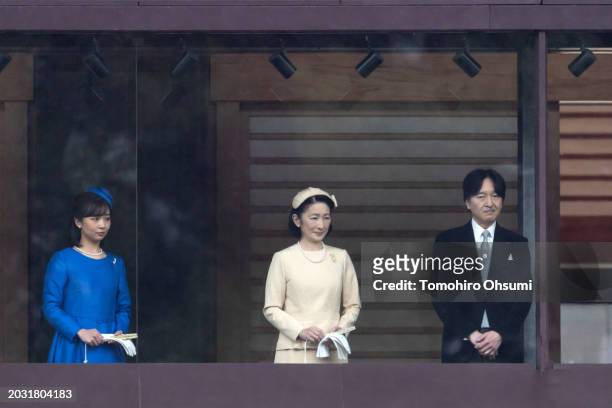 Princess Kako of Akishino, Crown Princess Kiko and Crown Prince Akishino stand on the balcony of the Imperial Palace on February 23, 2024 in Tokyo,...