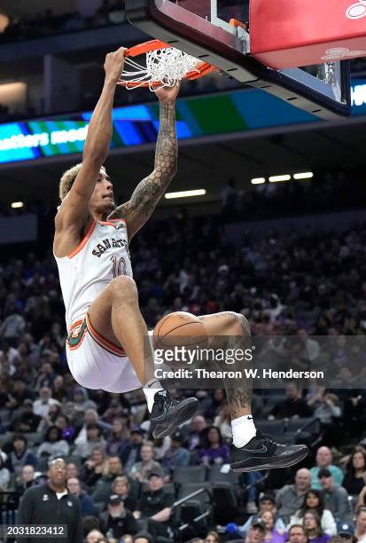 Jeremy Sochan of the San Antonio Spurs slam dunks against the Sacramento Kings in the second quarter at Golden 1 Center on February 22, 2024 in...