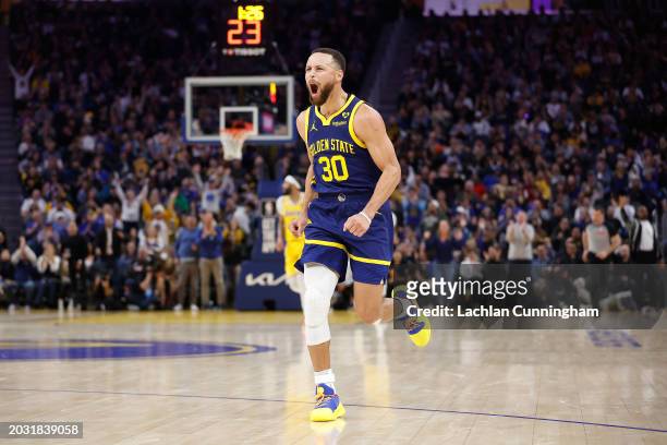 Stephen Curry of the Golden State Warriors reacts after making a three-point shot in the first half against the Los Angeles Lakers at Chase Center on...