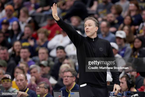 Head coach Brian Keefe of the Washington Wizards directs his team against the Denver Nuggets in the first quarter at Ball Arena on February 22, 2024...