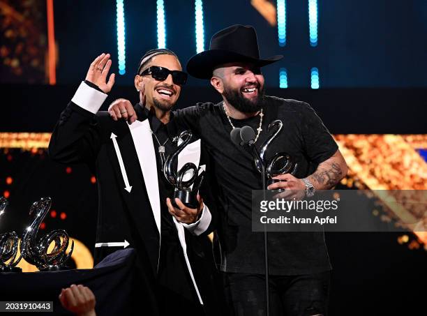 Maluma and Carin León accept multiple awards onstage during Univision's 36th Premio Lo Nuestro at Kaseya Center on February 22, 2024 in Miami,...