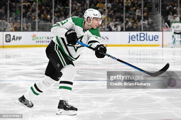 Esa Lindell of the Dallas Stars takes a shot against the Boston Bruins during the second period at the TD Garden on February 19, 2024 in Boston,...