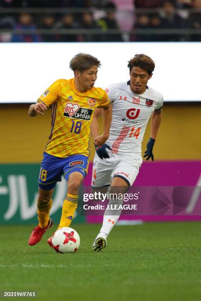 Hirotaka Mita of Vegalta Sendai controls the ball against Shintaro Shimizu of Omiya Ardija during the J.League J1 match between Vegalta Sendai and...