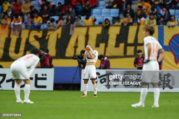Ryo Okui and Omiya Ardija players look dejected after the team's 0-3 defeat in the J.League J1 match between Vegalta Sendai and Omiya Ardija at...