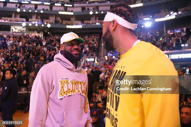 LeBron James and Anthony Davis of the Los Angeles Lakers talk before the game against the Golden State Warriors at Chase Center on February 22, 2024...
