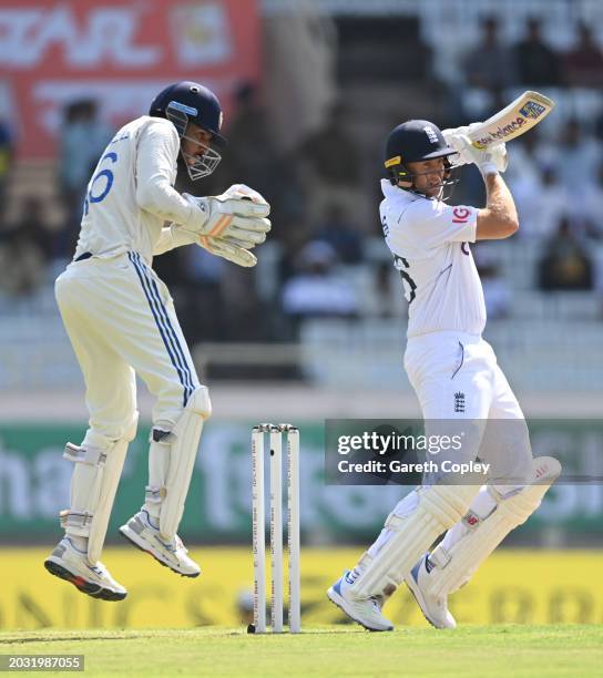 England batsman Joe Root in batting action watched by India wicketkeeper Dhruv Jurel during day one of the 4th Test Match between India and England...