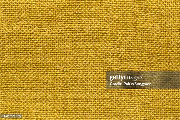 yellow sackcloth texture and textile background with full frame. - broderie photos et images de collection