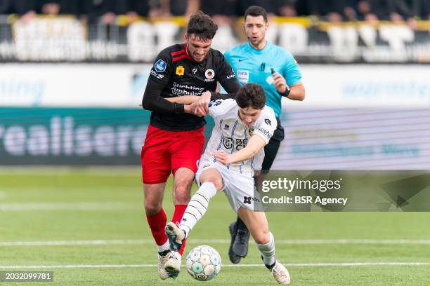 Troy Parrott of Excelsior Rotterdam battles for the ball with Paxten Aaronson of Vitesse during the Dutch Keuken Kampioen Divisie match between...