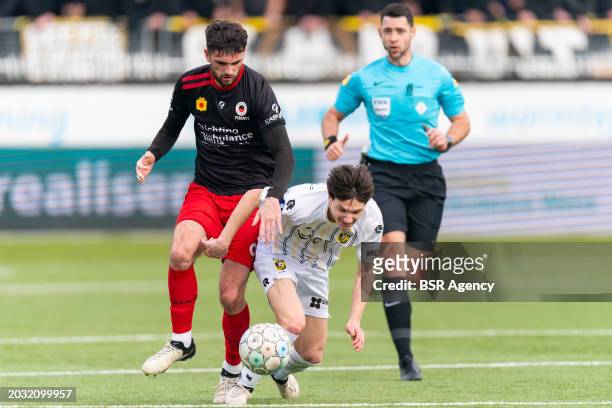 Troy Parrott of Excelsior Rotterdam battles for the ball with Paxten Aaronson of Vitesse during the Dutch Keuken Kampioen Divisie match between...