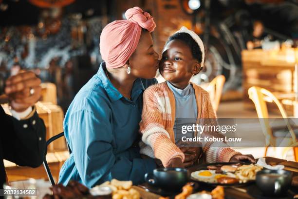 black family, restaurant and eating with mom kiss and child together with bonding, food and care. love, diner and table with burgers and happy girl with lunch and hungry people in a cafe with drink - africa stock pictures, royalty-free photos & images