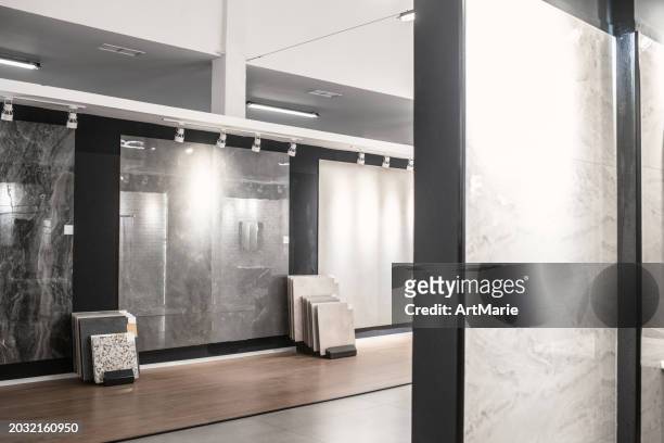 sample tile flooring in a store - tile showroom stock pictures, royalty-free photos & images
