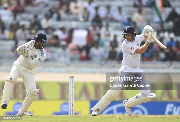 England batsman Joe Root in batting action watched by India wicketkeeper Dhruv Jurel during day one of the 4th Test Match between India and England...