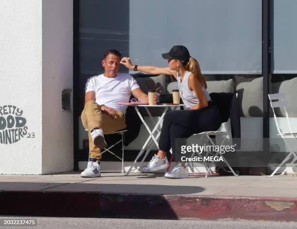 Maria Menounos is seen drinking a coffee on February 24, 2024 in Los Angeles, California.