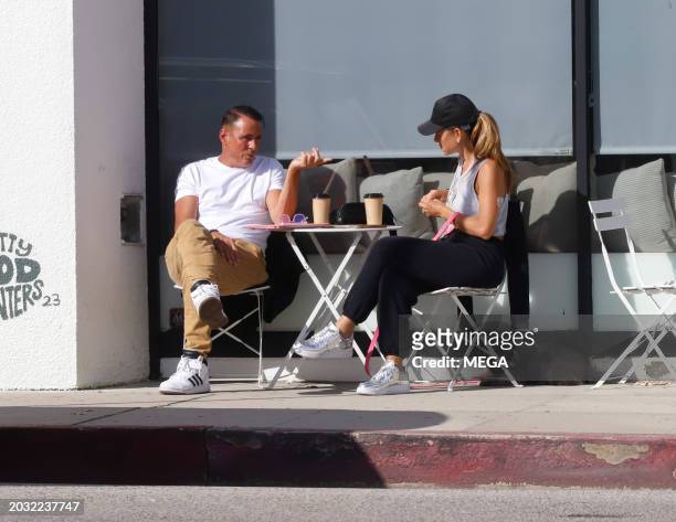 Maria Menounos is seen drinking a coffee on February 24, 2024 in Los Angeles, California.