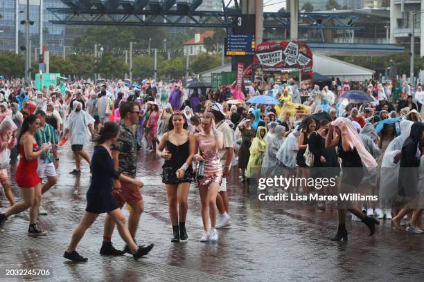 Taylor Swift fans, also known as "Swifties", brave wild weather outside Accor Stadium for Taylor Swift's first Sydney concert on February 23, 2024 in...