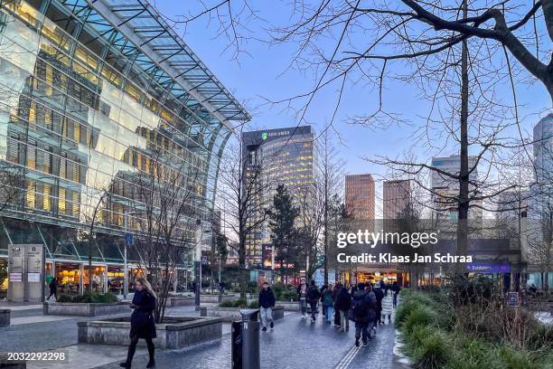 glass tower buildings in the financial center of the city of amsterdam in holland the netherlands called the zuid-as which includes the central station and abn amro - amsterdam zuidas stock pictures, royalty-free photos & images