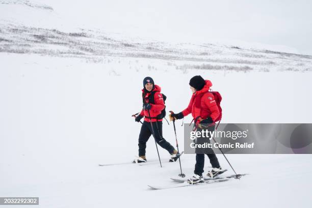 Vicky Pattison and Alex Scott during the final day of the 'Snow Going Back' challenge skiing through the snowy Arctic landscape towards the finish...