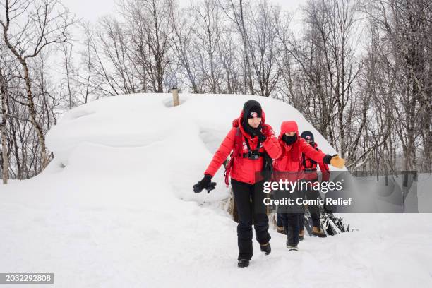 Vicky Pattison, Sara Davies, Alex Scott and Laura Whitmore during the final day of the 'Snow Going Back' challenge coming out of the hut where they...