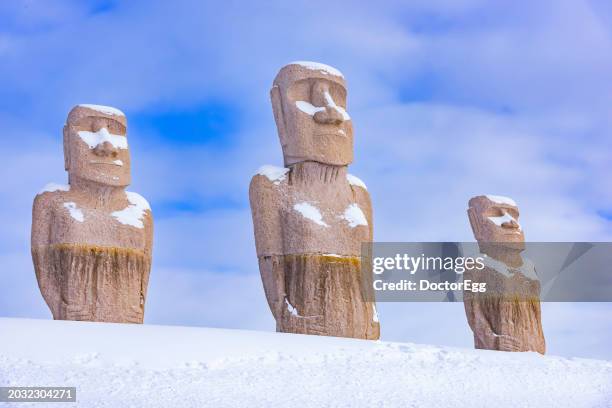 moai sculptures coverd with snow in winter at hill of buddha, sapporo, hokaido, japan - snow coverd stock pictures, royalty-free photos & images
