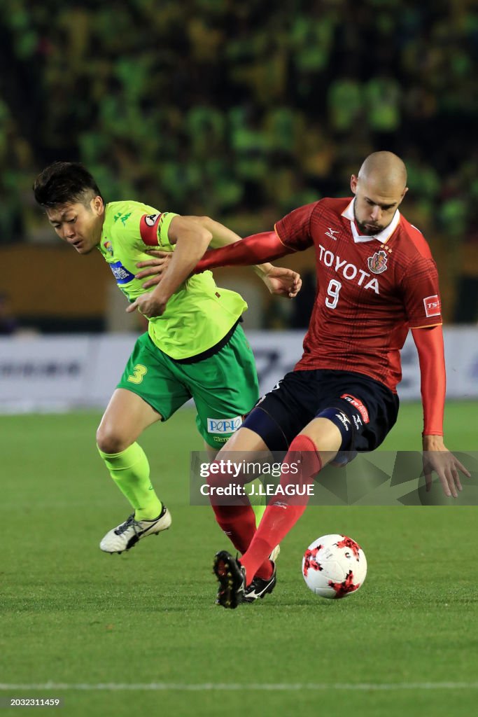 Robin Simovic Robin Simovic of Nagoya Grampus controls the ball against Naoya Kondo ...