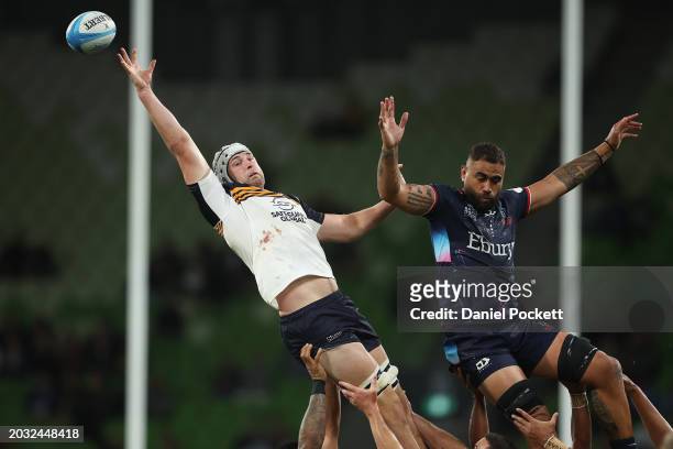 Nick Frost of the Brumbies and Lukhan Salakaia-Loto of the Rebels compete in a line out during the round one Super Rugby Pacific match between...