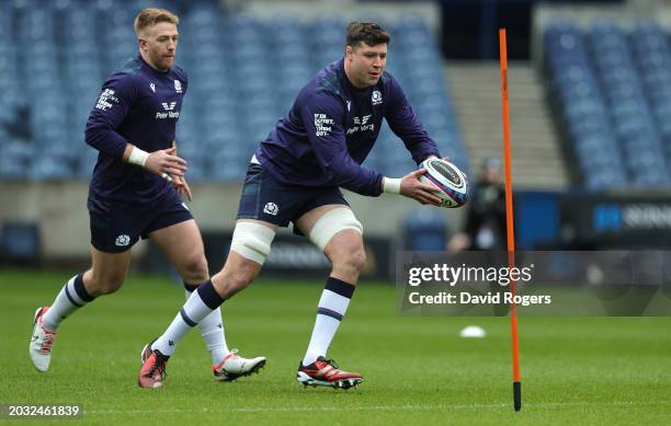 Grant Gilchrist runs with the ball during the Scotland Captain's Run ahead of the Guinness Six Nations 2024 match against England at BT Murrayfield...