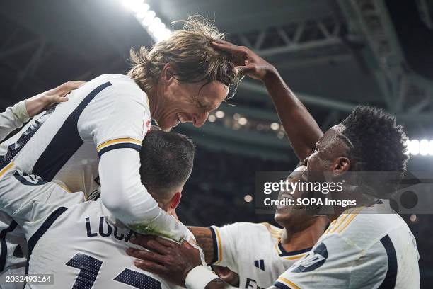 Luka Modric of Real Madrid CF celebrates a goal against Sevilla FC with Vinicius Junior , Rodrygo Goes of Real Madrid CF and Lucas Vazquez of Real...